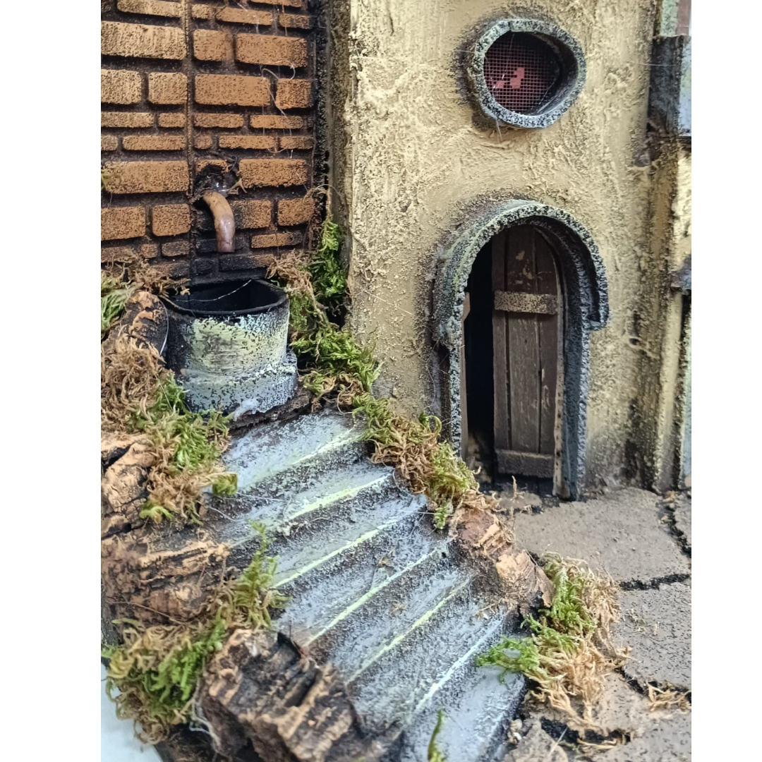 Presepe con fontana e arcata a destra