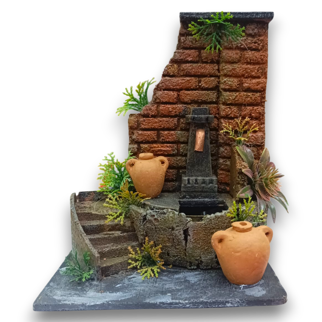 Fontana Nasone con parete in mattoncini rossi